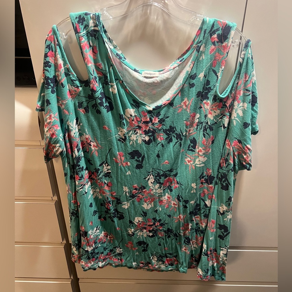 Floral blouse with exposed shoulder